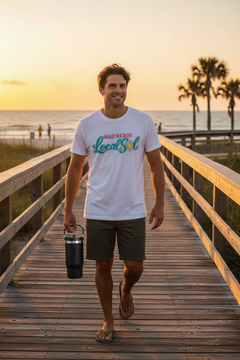 Man with Local Sol Tee Holding Black Stanley